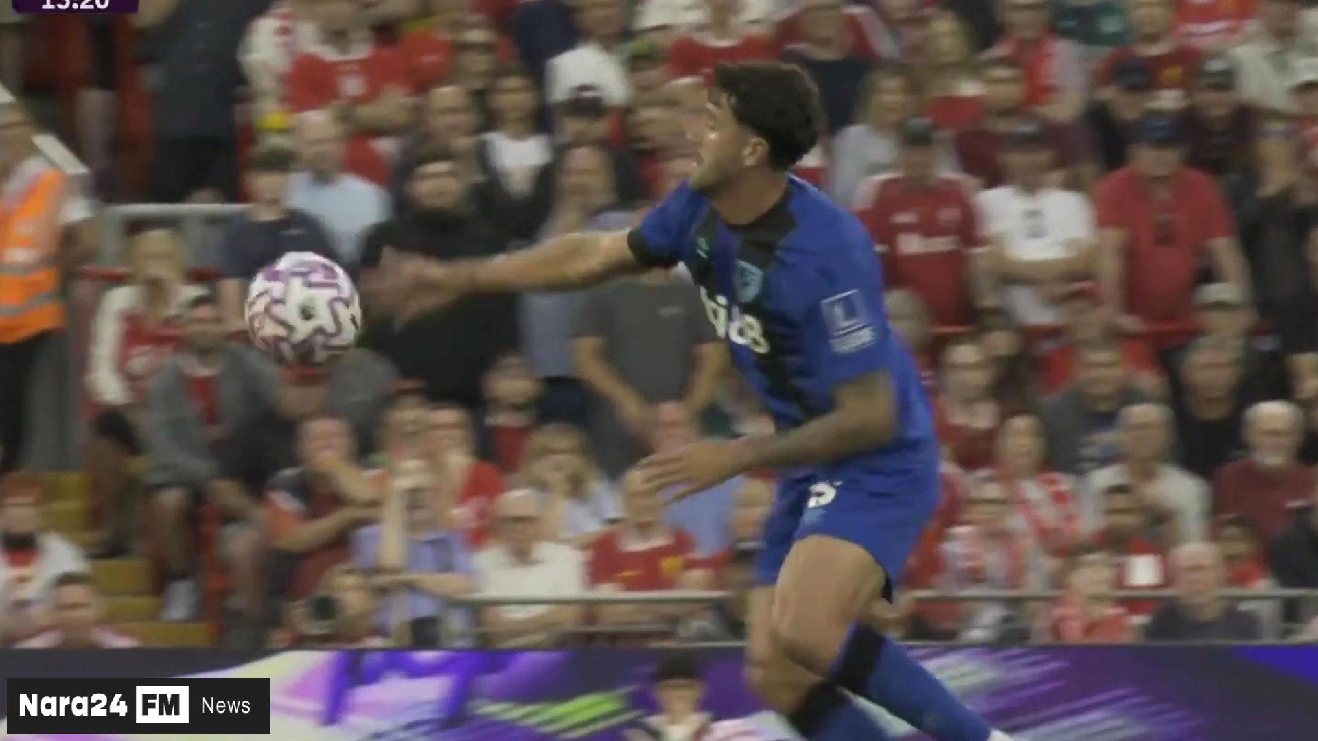 "Carragher slams VAR for feeding ref 'wrong information' after blatant handball"
    New Title Idea: "Carragher Condemns VAR Error as Senesi Escapes Red Card in Liverpool Thriller"

 3.