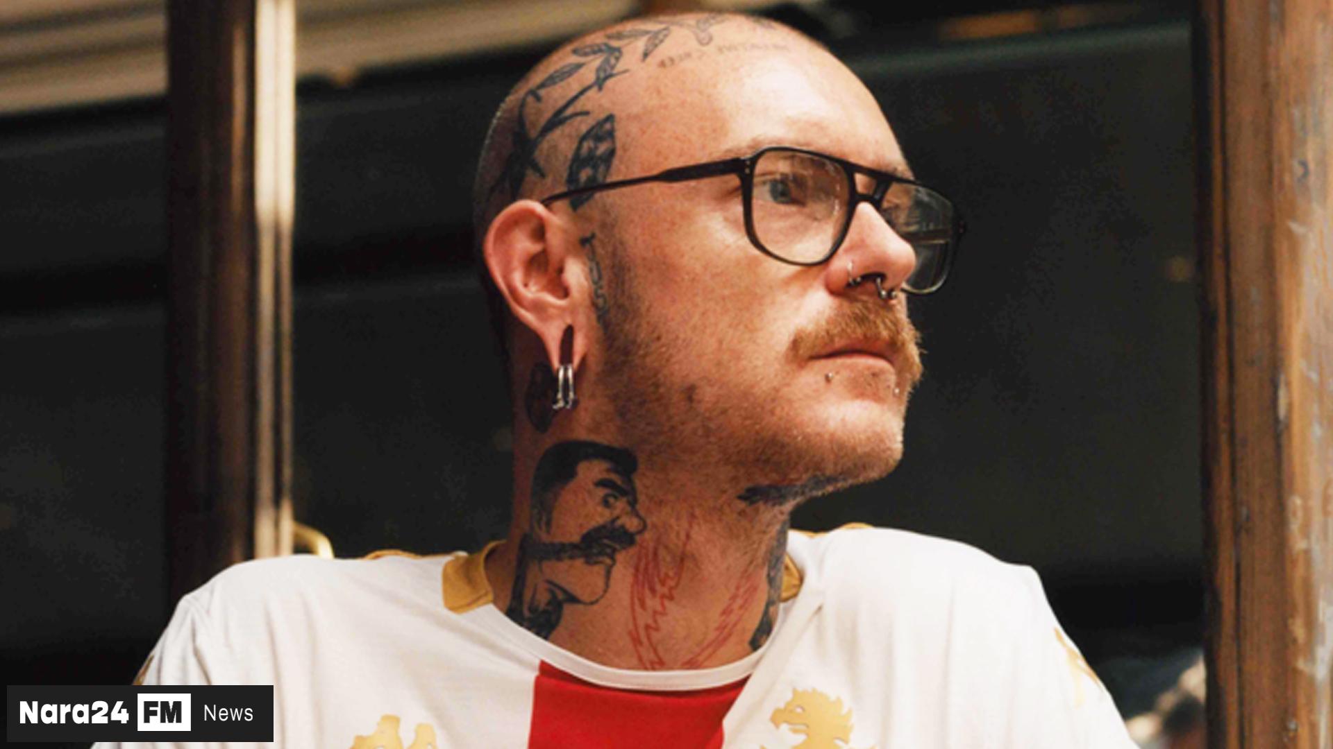 Genoa’s St. George’s Cross Kit Launch Overshadowed by Model’s Racy Tattoo*  **
