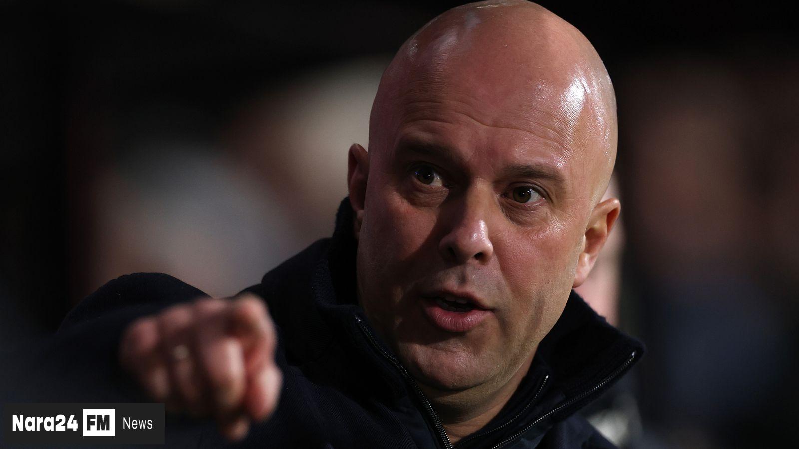 Carragher Warns: Slot's Liverpool Future Hangs on Champions League Qualification